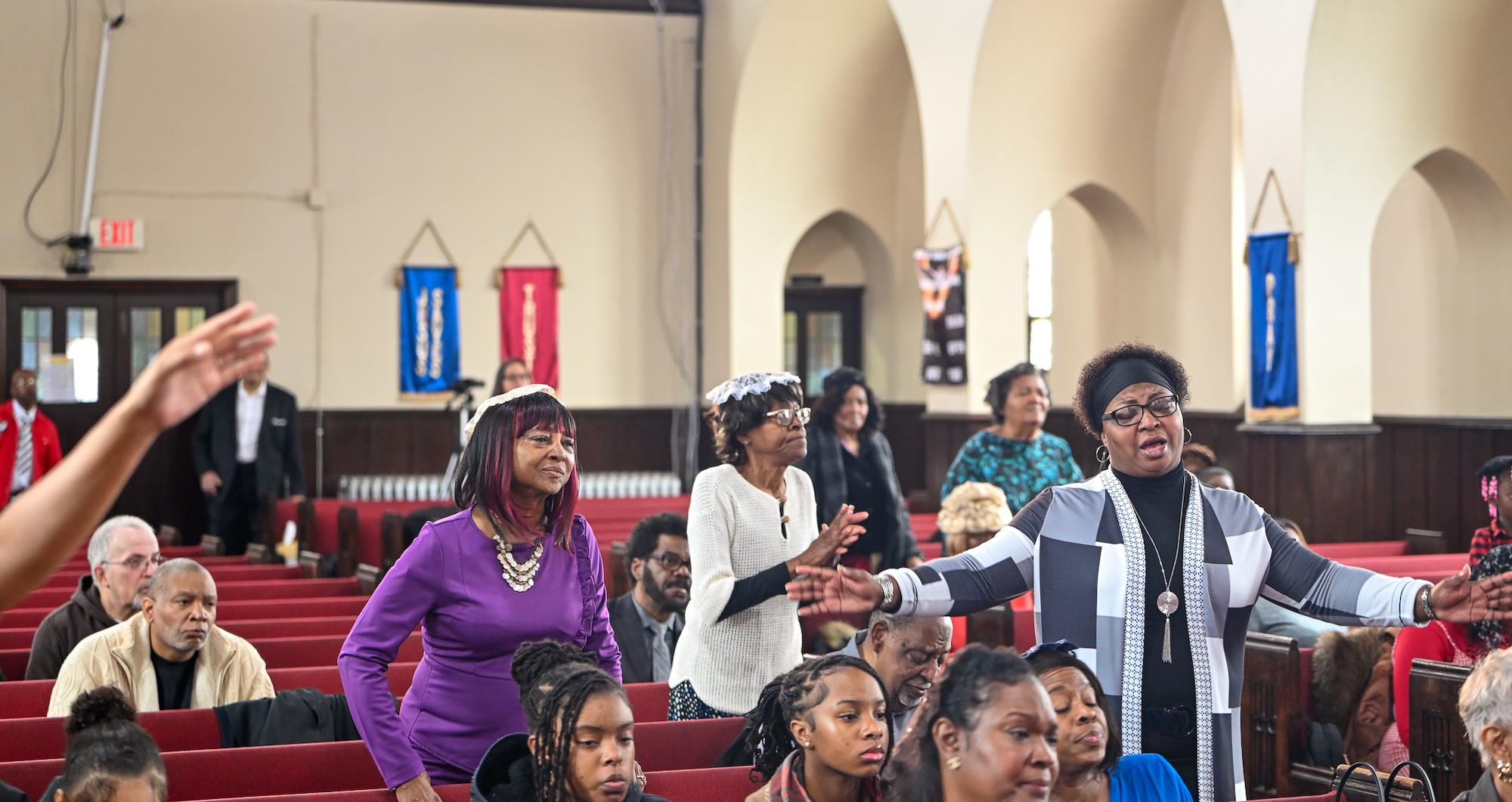 Pilgrim Church of Christ congregation in praise and worship